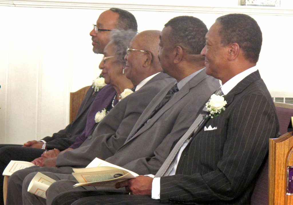 Sitting in the front row at Antioch Baptist Church, James Speed Jr. and the other Black History month celebration honorees listen to a speech. Speed is a native of Oxford and went to undergraduate at North Carolina Central University. (Staff photo by Bradley Saacks) 