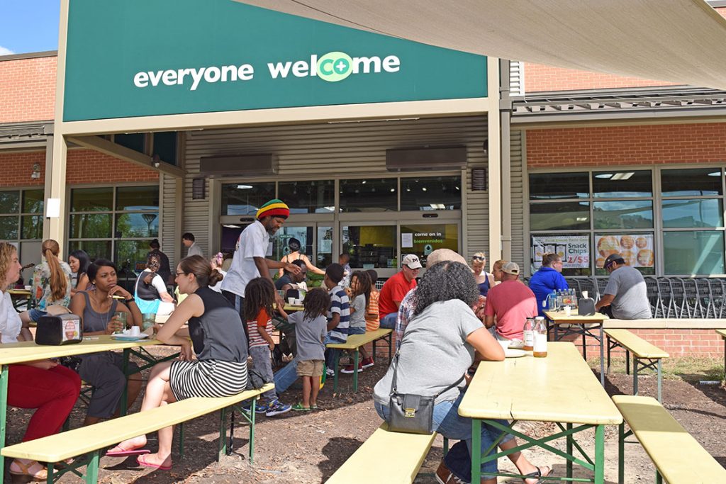Durham residents enjoyed live music and free grilled cheese sandwiches at the Durham Co-op Market’s second annual “Neighbor Day” Saturday afternoon. The co-op opened in April 2015. 