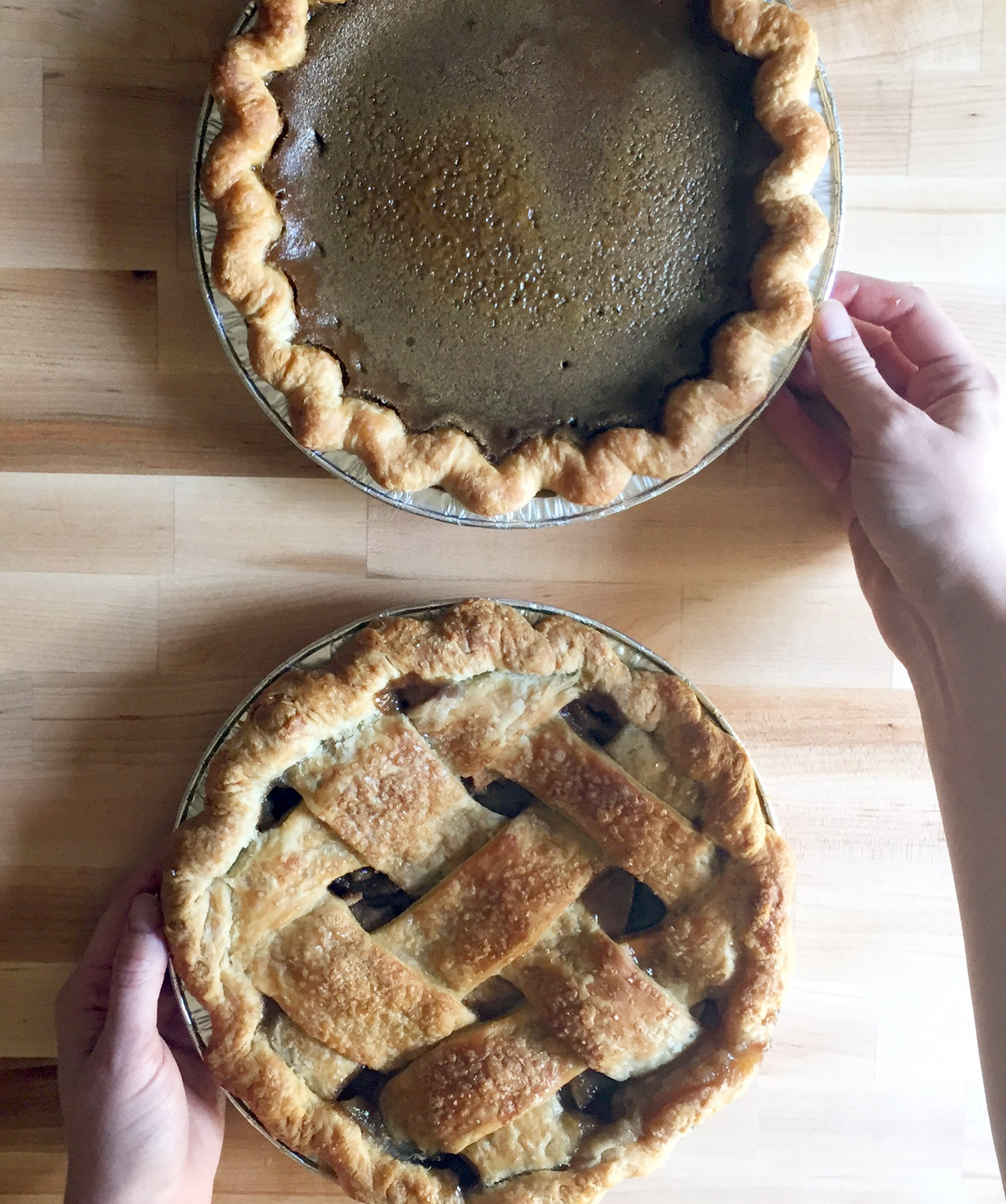Ali Rubel in her home kitchen with two of her savory pies. (Photo by Ben Filippo)